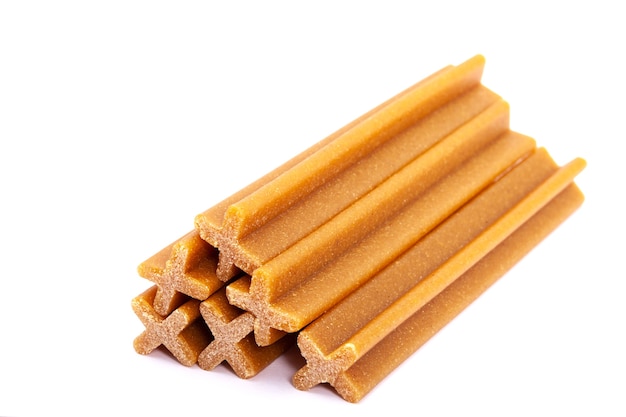 Edible sticks, treat for dogs isolated on a white background