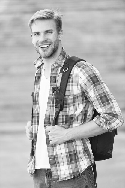 Education boost successful future Man regular student appearance College education College life Modern student College student with backpack urban background Handsome guy study in university