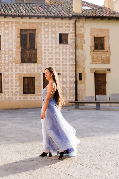 Education college graduate happy student hispanic woman in salamanca spain outdoors smiling