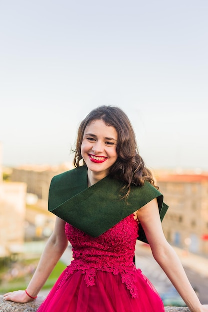 Education college graduate happy student Hispanic woman in Salamanca Spain outdoors smiling