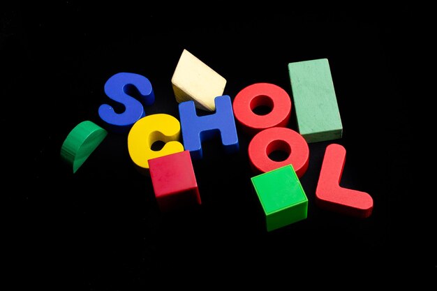 Photo education concept by school lettering with colorful wooden letters