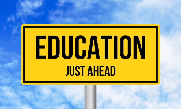 Education just ahead road sign on sky background