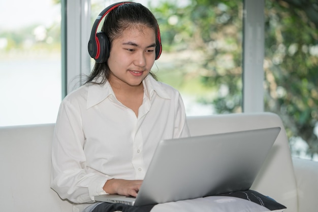 Education learning online concept Teen girl using computer laptop to self learning online