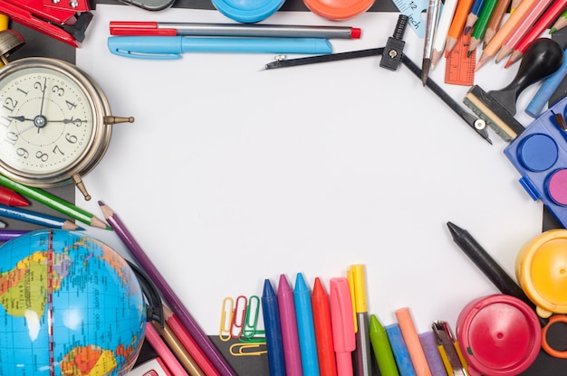 Education school tools on Black Chalkboard  Background