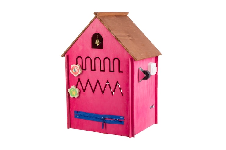 Photo educational wooden toy on a white backgroundtoy wooden house