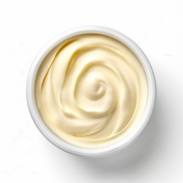 Foto een bakje mayonaise met een crème erin.