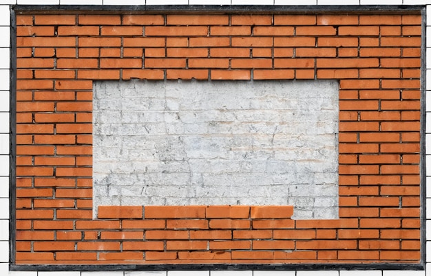 Een bakstenen muur met een blank bord dat " rechthoek " zegt.