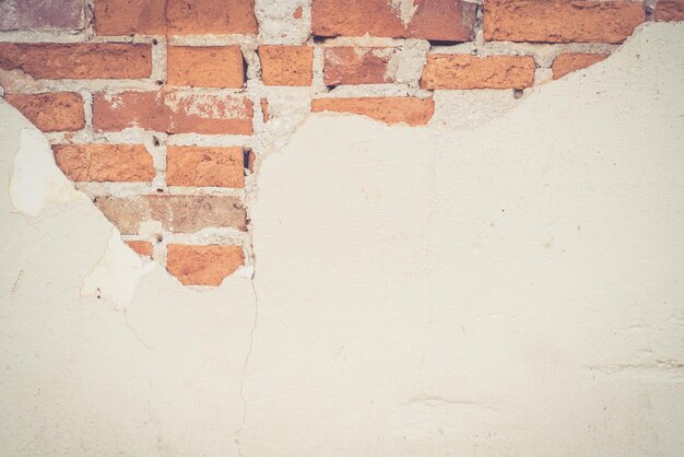 Foto een bakstenen muur met het woord baksteen erop