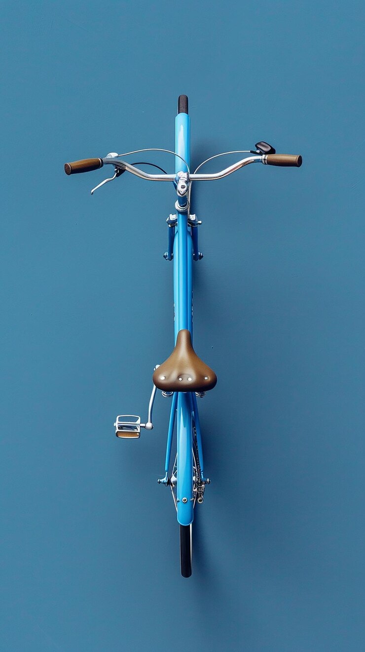 Foto een blauwe fiets met een bruine stoel en een bruine lederen stoel