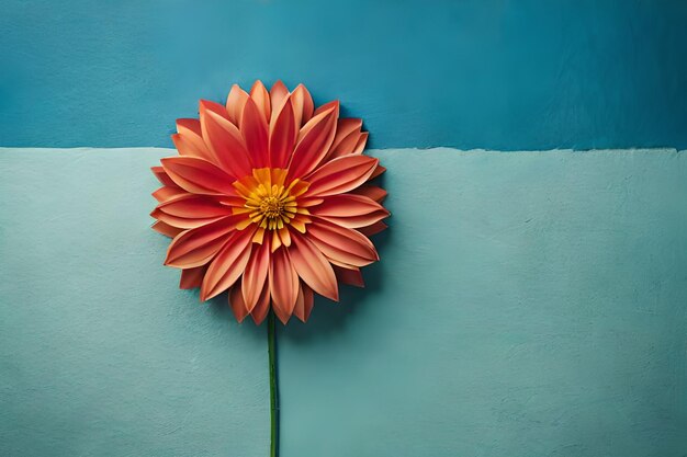 Een bloem op een blauwe achtergrond met een blauwe achtergrond.