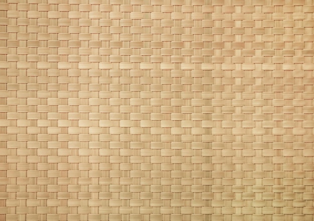 Een bruine geweven stof met een vierkant patroon.