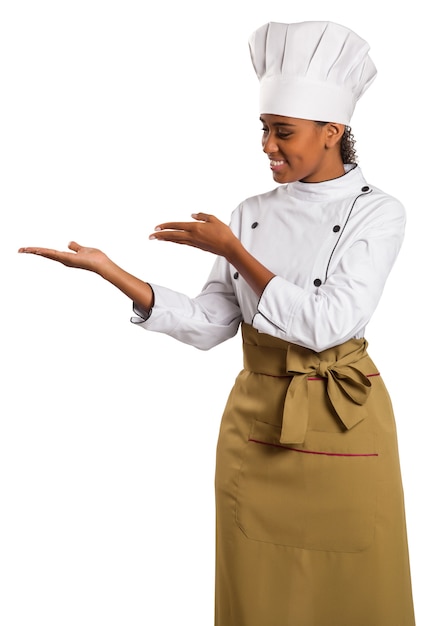 Een chef-kok met haar lege handen voor het vasthouden van uw producten in de witte ruimte.