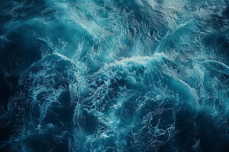 Foto een close-up van een golf met de woorden de oceaan op de bodem