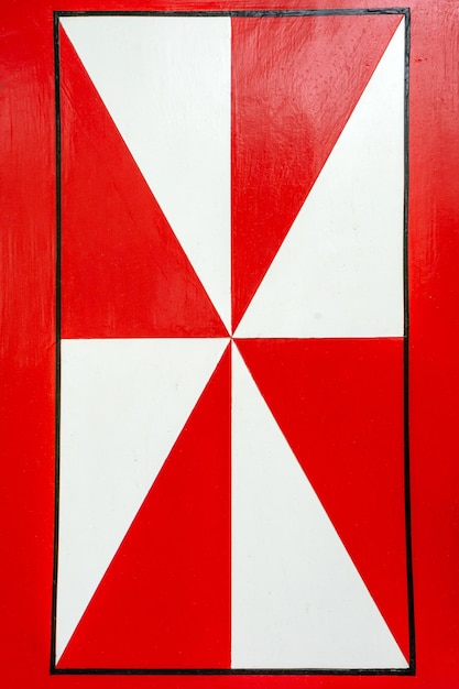 Een deel van houten luiken met rood en wit patroon Achtergrondstructuur