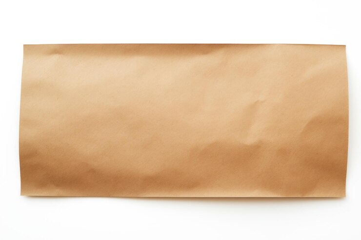 Foto een enkel ongebleekt papier geïsoleerd op een witte achtergrond