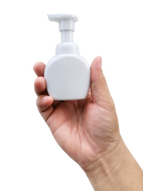 Een fles vloeibare zeep in de hand geïsoleerd op een witte achtergrond