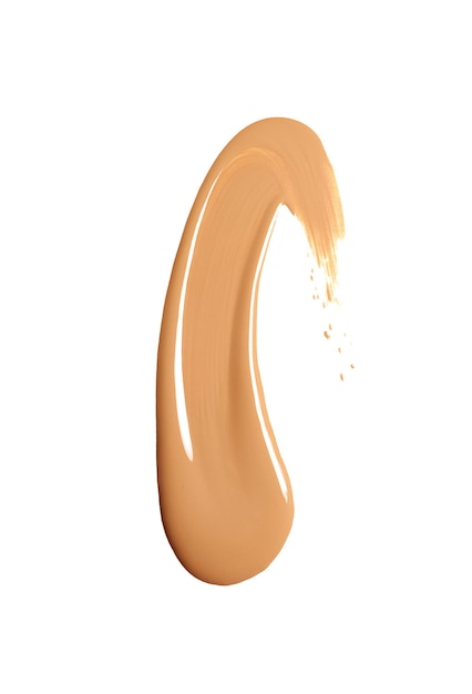 Een gladde gebogen monster van vloeibare foundation of concealer in een warme beige toon