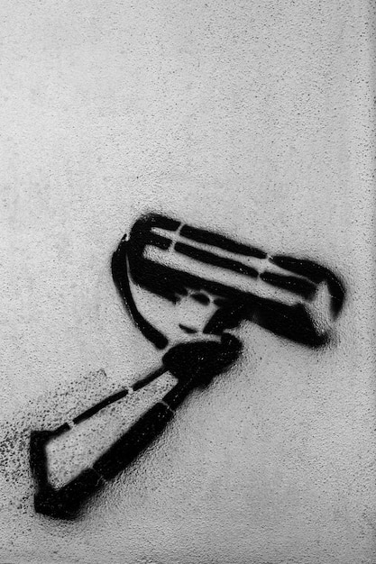 Een graffiti protest tegen de controle en het systeem