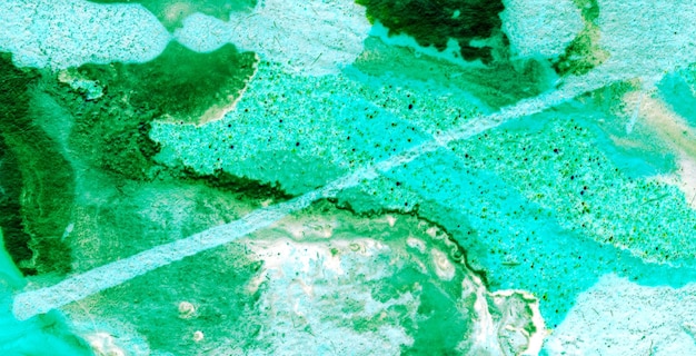 Foto een groen en blauw stuk glas met een witte lijn in het midden