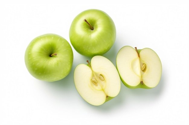 een groep groene appels die bovenop een wit oppervlak zitten