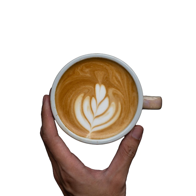 Een hand met een kopje koffie met latte art erop