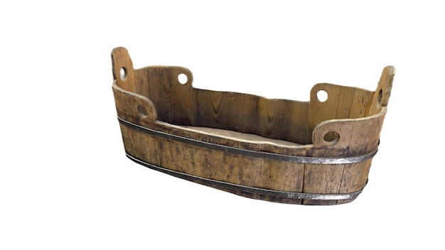Foto een houten bumper met metalen ring met een metalen ring waar 'het woord' op staat