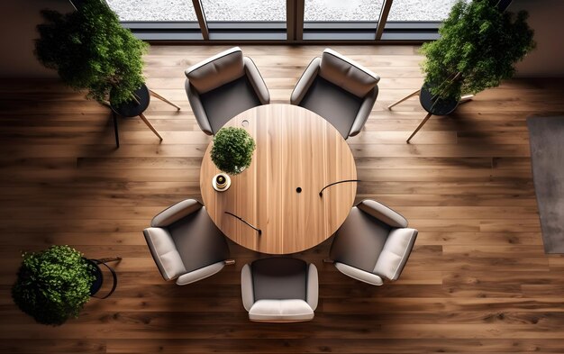 Een kamer met een ronde tafel en stoelen met daarop een plant.