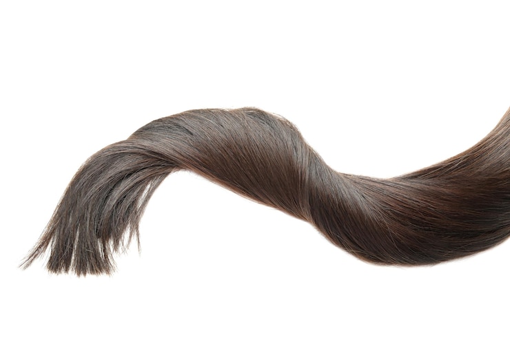 Foto een lok vrouwelijk haar op een witte achtergrond
