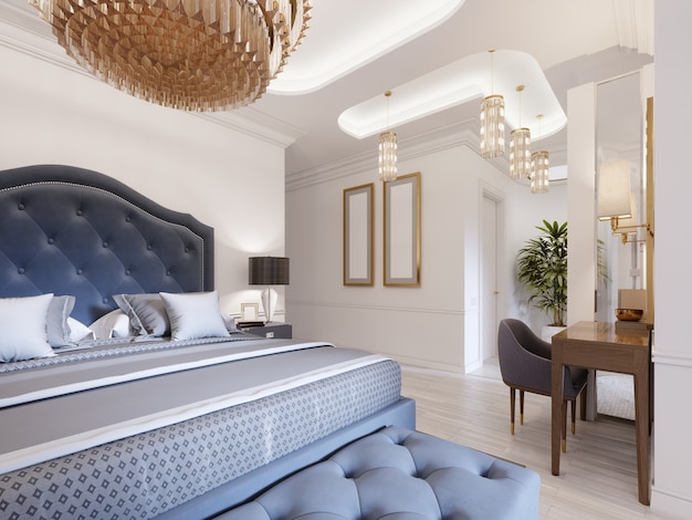 Een luxe slaapkamer in klassieke stijl met gouden elementen en een blauw bedlaken en een houten dressoir en kaptafel. 3D-rendering.