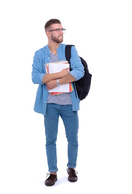 Een mannelijke student met een schooltas met boeken geïsoleerd op een witte achtergrond Onderwijskansen College student