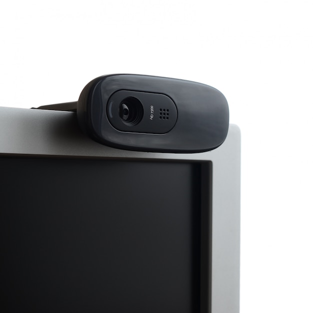 Een moderne webcamera is geïnstalleerd op het lichaam van een flatscreenmonitor