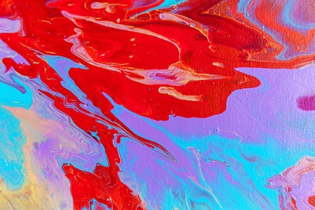 Een mooie acrylachtergrond in rode en blauwe kleuren Abstract kleurrijk textuurbehang