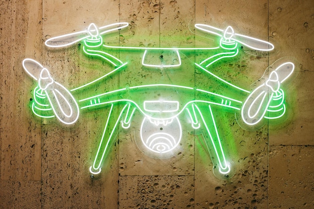 Foto een neonbord met de tekst drone erboven