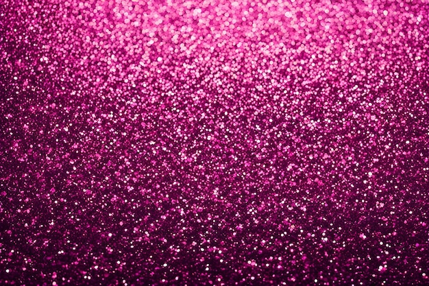 Een roze achtergrond met glinsterende stippen