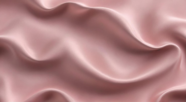 Foto een roze zijde wordt weergegeven met een roze achtergrond