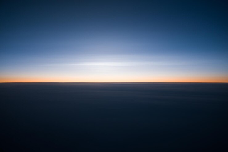 Foto een schilderachtig uitzicht op het landschap tegen de hemel tijdens de zonsondergang