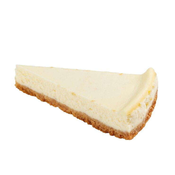 Foto een stuk cheesecake geïsoleerd op een witte achtergrond