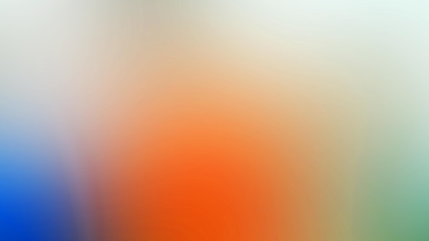 Een wazig beeld van een kleurrijk oranje en rood gekleurd glas.