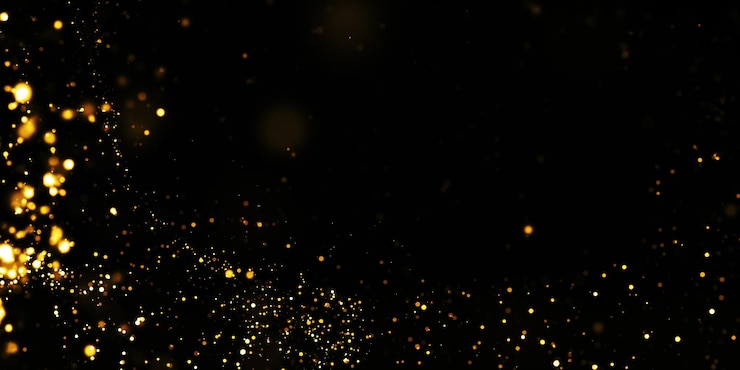 Foto een zwarte achtergrond met gouden glitter erop