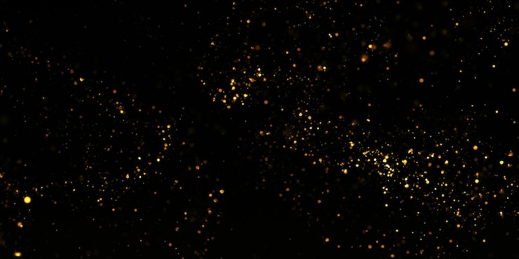Foto een zwarte achtergrond met gouden stippen