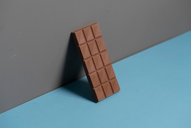 Een zwarte chocoladereep als toetje