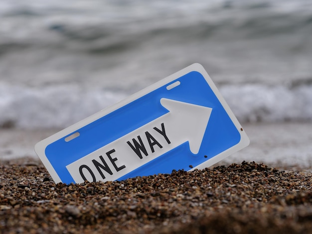 eenrichtingsbord op het strand