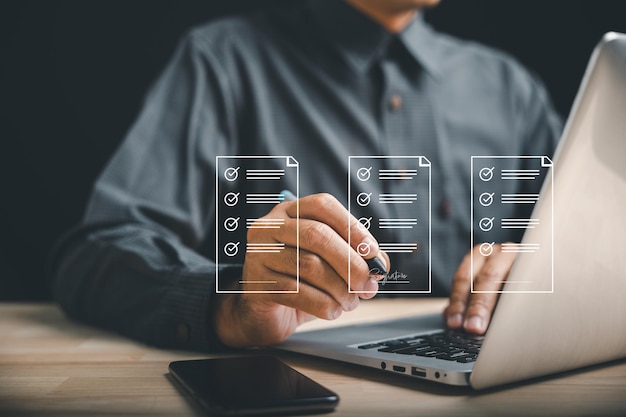 Photo efficient document management businessman uses pen to sign electronic documents on virtual screen