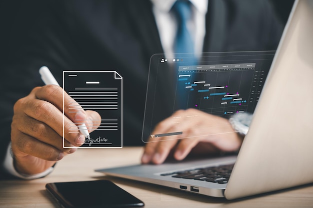 Efficient document management Businessman uses pen to sign electronic documents on virtual screen