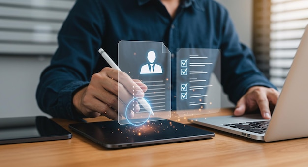 efficient recruitment man reviewing digital applications on multiple devices candidate profile and