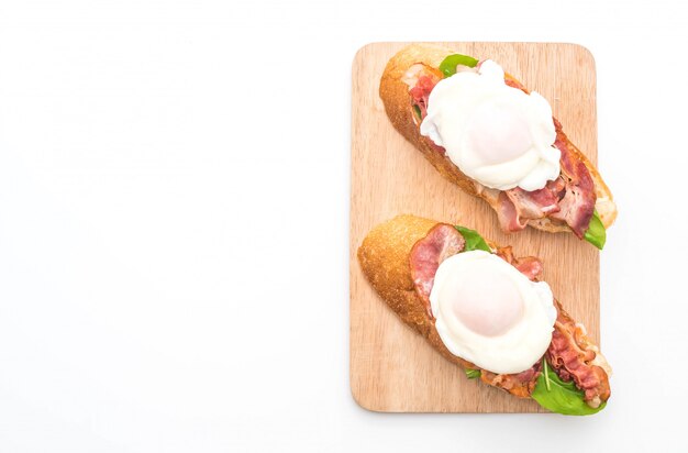 egg benedict on white background