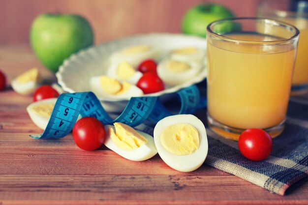 Egg breakfast fruit wooden background