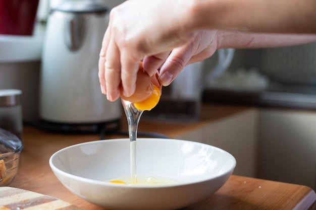 Egg broken into a bowl Preparation of ingredients for breading