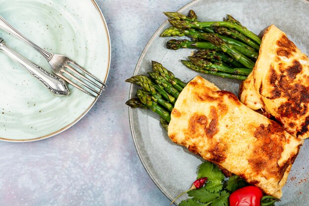 Egg omelet with asparagus and greens Healthy breakfast