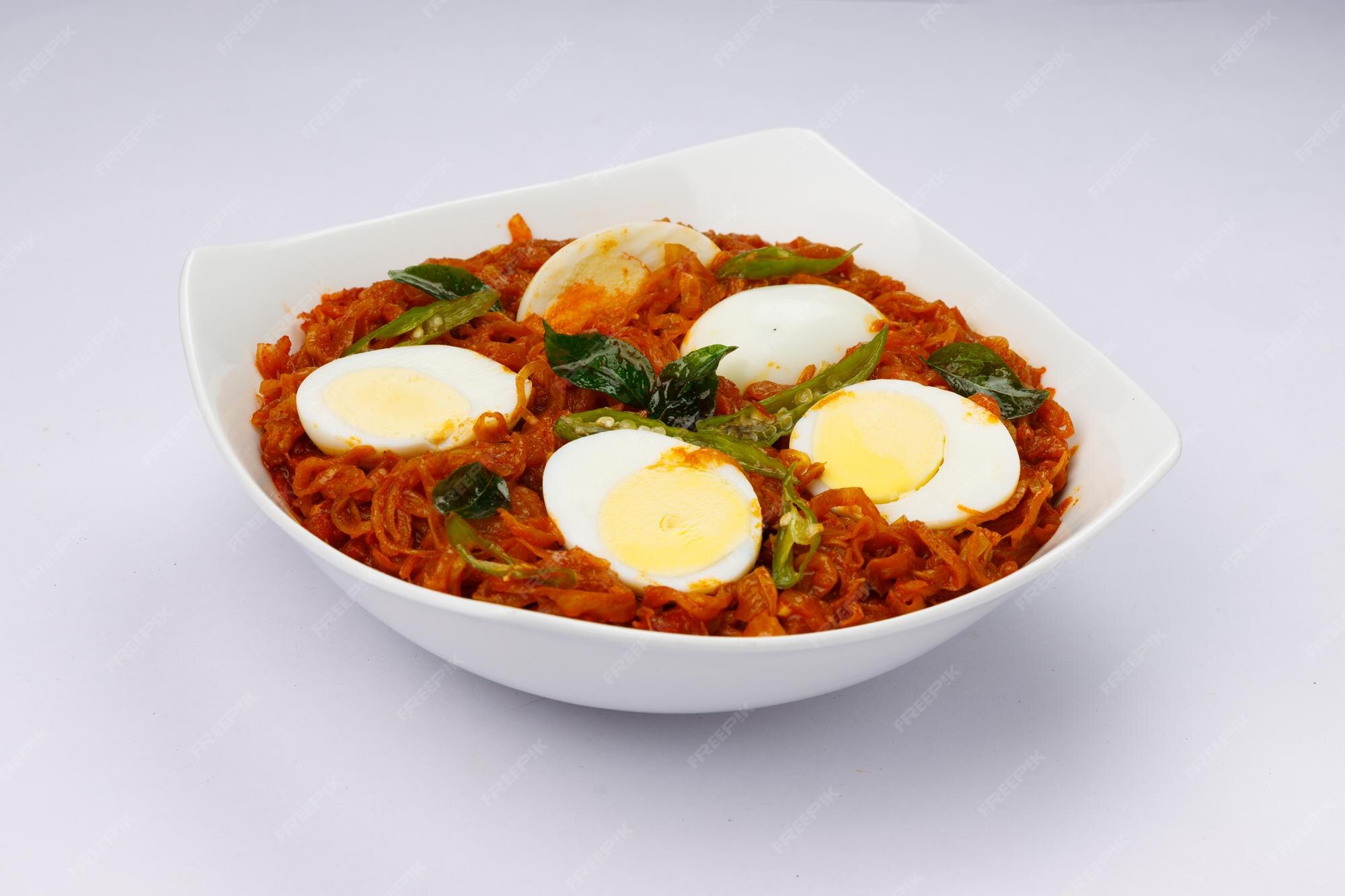 Premium Photo | Egg roast or Indian egg masala curry spicy red egg